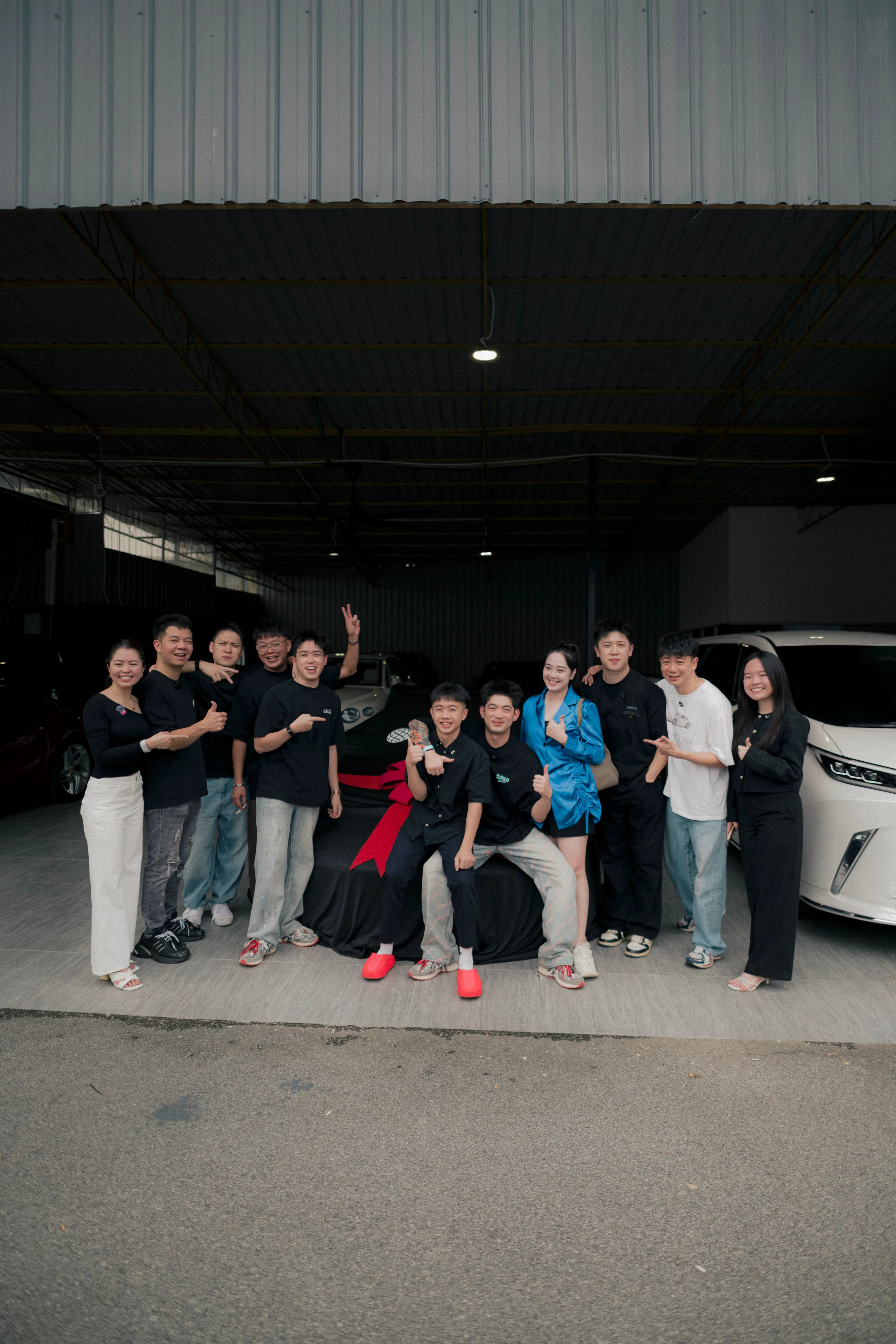 Team portrait at the D&Dream car unveiling